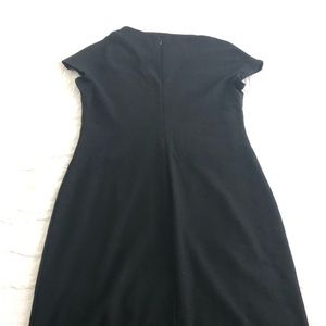 Black dress with asymmetrical high boat neck